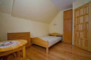 Posteľ alebo postele v izbe v ubytovaní Pokoje Apartamenty Pod Limbą