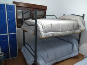 Dviaukštė lova arba lovos apgyvendinimo įstaigoje Casa Rural El Albergue