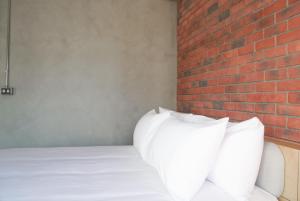 Katil atau katil-katil dalam bilik di 鬧鐘關掉旅店 Alarm Off B&B
