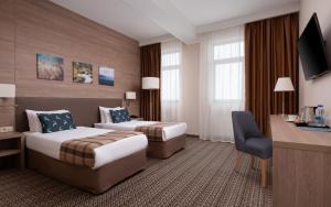 Кровать или кровати в номере Medical Spa Hotel Rosa Springs