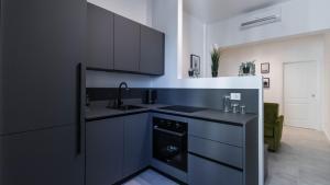 A kitchen or kitchenette at Cavour 82