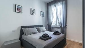 A bed or beds in a room at Cavour 82