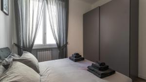 A bed or beds in a room at Cavour 82
