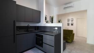 A kitchen or kitchenette at Cavour 82