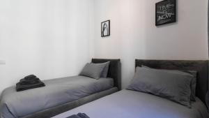 A bed or beds in a room at Cavour 82