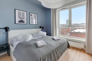 Posteľ alebo postele v izbe v ubytovaní Grand Apartments - Bastion Wałowa Modern Apartament Gdańsk