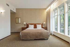 Postel nebo postele na pokoji v ubytování Dikker & Thijs Hotel