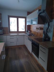 Köök või kööginurk majutusasutuses Appartement Schmittenblick