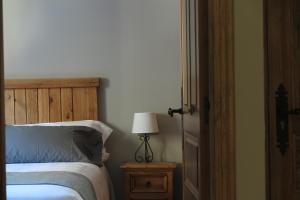 Postel nebo postele na pokoji v ubytování Apartamentos Casa Pochetas