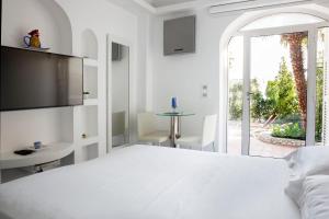 Posteľ alebo postele v izbe v ubytovaní LHP Suite Capri Villa La Giara + 37 fotografií