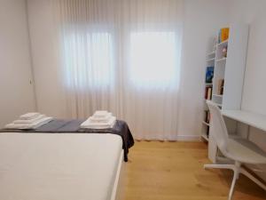 A bed or beds in a room at Casa Meltemi