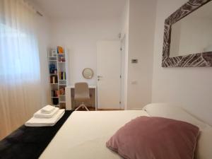 A bed or beds in a room at Casa Meltemi