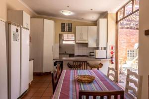 Kuchyň nebo kuchyňský kout v ubytování Bay Vista Guesthouse