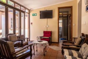 TV a/nebo společenská místnost v ubytování Bay Vista Guesthouse
