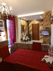 TV a/nebo společenská místnost v ubytování MB Place Abano Terme