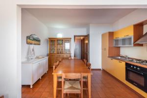 Kuchyň nebo kuchyňský kout v ubytování Accu is Prezzus C fronte mare