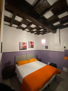 Tempat tidur dalam kamar di Emerald Fields