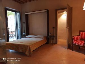 Posteľ alebo postele v izbe v ubytovaní Villa di Campagna Santa Giulia