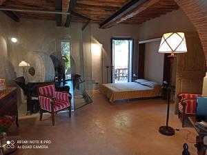 Posteľ alebo postele v izbe v ubytovaní Villa di Campagna Santa Giulia