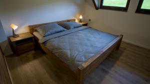 Postel nebo postele na pokoji v ubytování Apartmán pod Pustým vrchem