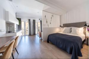 Posteľ alebo postele v izbe v ubytovaní Real Segovia Apartments by Recordis Hotels
