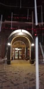 an entrance to a subway station at night at Snow Dreams 1 Grand Monastery in Pamporovo