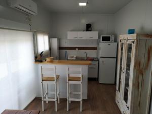 Virtuvė arba virtuvėlė apgyvendinimo įstaigoje Casita de Piedra 5