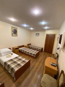 Postel nebo postele na pokoji v ubytování Inn Khlibodarskiy