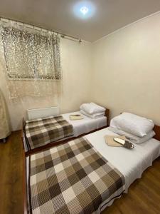 Postel nebo postele na pokoji v ubytování Inn Khlibodarskiy