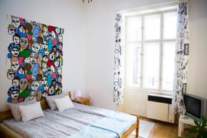Ένα ή περισσότερα κρεβάτια σε δωμάτιο στο Sipi Apartman