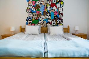 Ένα ή περισσότερα κρεβάτια σε δωμάτιο στο Sipi Apartman