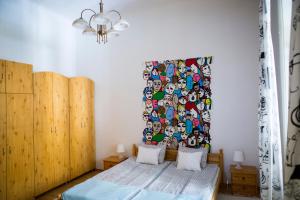Ένα ή περισσότερα κρεβάτια σε δωμάτιο στο Sipi Apartman