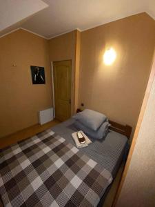 Postel nebo postele na pokoji v ubytování Inn Khlibodarskiy