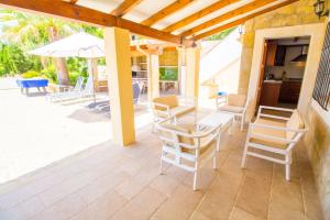 Patio alebo iná vonkajšia časť ubytovania Perfecta villa para vacaciones con wifi y A/C