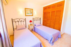 Posteľ alebo postele v izbe v ubytovaní Perfecta villa para vacaciones con wifi y A/C