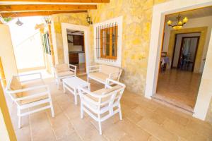 Patio alebo iná vonkajšia časť ubytovania Perfecta villa para vacaciones con wifi y A/C