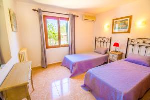Posteľ alebo postele v izbe v ubytovaní Perfecta villa para vacaciones con wifi y A/C + 29 fotografií