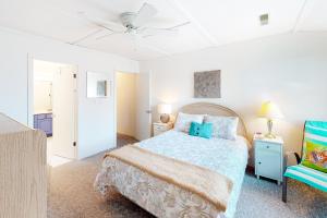 a bedroom with a bed and a ceiling fan at Mallard Lakes -- 38243 Cardinal #115 in Selbyville +27 photos