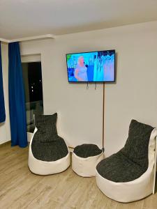 Телевизор и/или развлекательный центр в Big Und Nice 3 Bedrooms