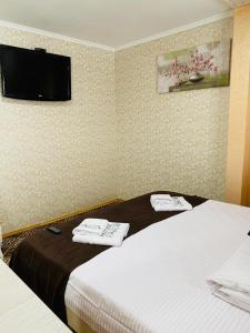 Postel nebo postele na pokoji v ubytování Під явором NEW