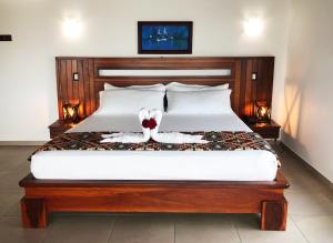 Postel nebo postele na pokoji v ubytování La Bocana de Quiximies Hotel