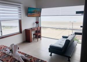 TV a/nebo společenská místnost v ubytování La Bocana de Quiximies Hotel