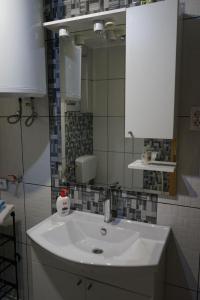 Ванная комната в Apartman Volijak