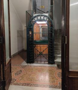 an entrance to a building with an iron gate at Corso Experience in Rome