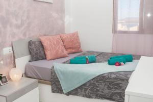 Posteľ alebo postele v izbe v ubytovaní aptsmile sillot + 37 fotografií
