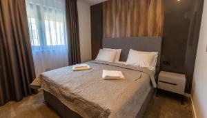 Postel nebo postele na pokoji v ubytování Villa Braga a4