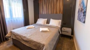 Postel nebo postele na pokoji v ubytování Villa Braga a4