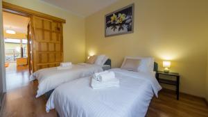 Łóżko lub łóżka w pokoju w obiekcie Komfortowy Apartament w centrum Ustronia
