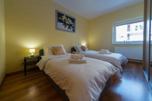 Łóżko lub łóżka w pokoju w obiekcie Komfortowy Apartament w centrum Ustronia