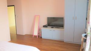 Μια τηλεόραση ή/και κέντρο ψυχαγωγίας στο Xin Zhu Homestay